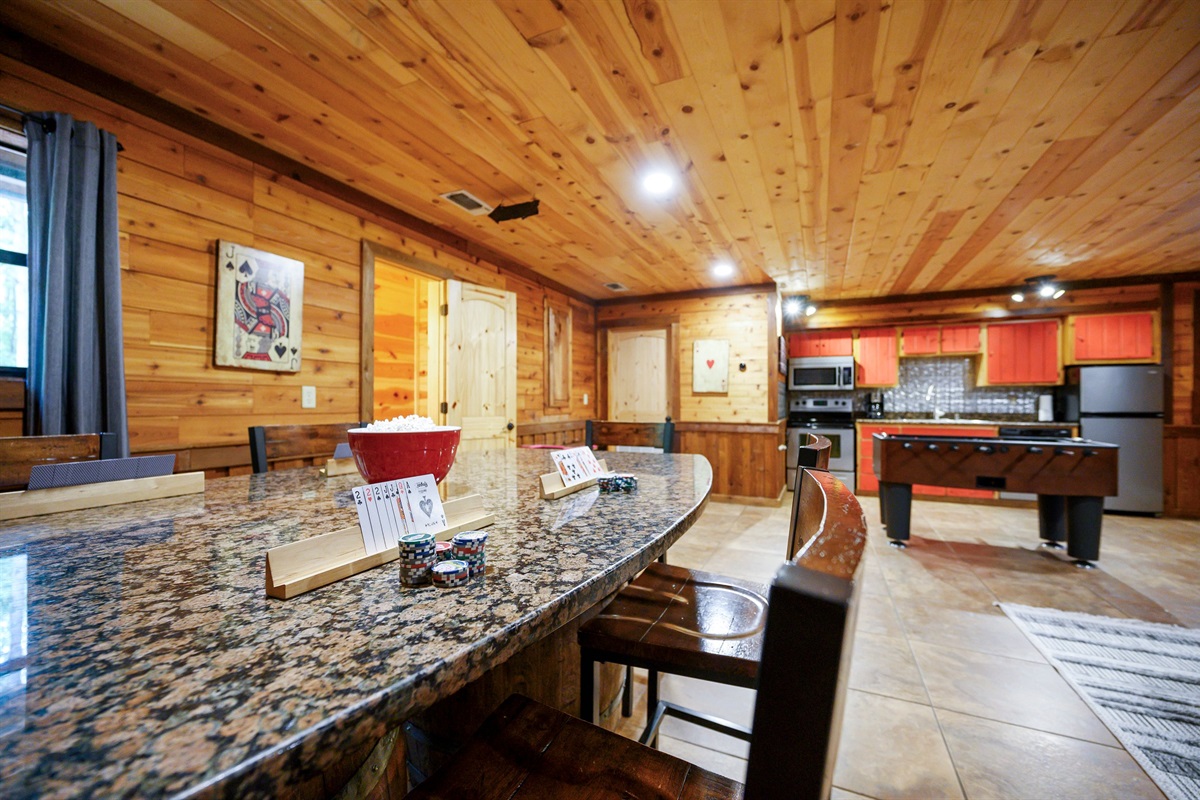 Pub table provides seating for 6 for dining or games.