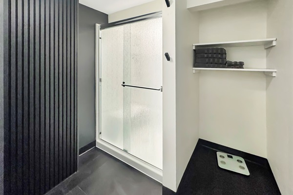 Unwind in this beautifully updated bathroom with contemporary style