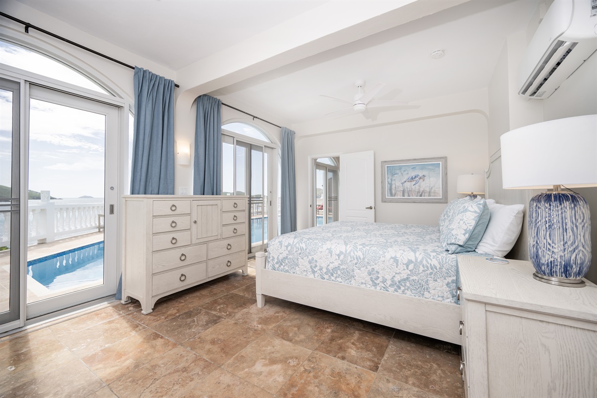 Downstairs Apartment Bedroom: This bedroom is located in the apartment on the second level of the home, also the same level as the pool. It includes a king sized bed.