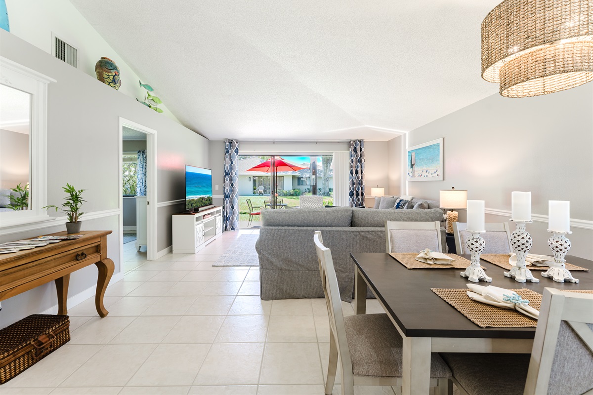 Bright open-concept living with dining for 6 and a fully upgraded kitchen featuring modern finishes, breakfast bar seating, and everything you need to cook and entertain
