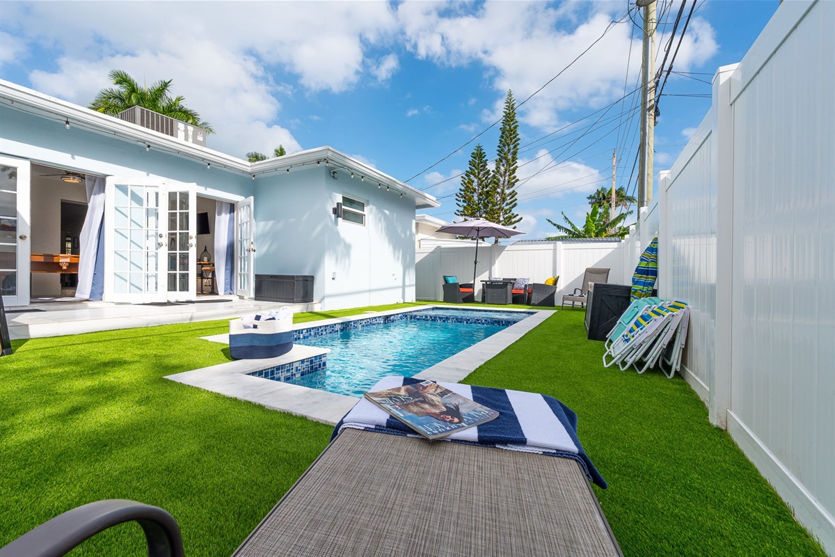 Enjoy your own private pool and hot tub, gas fire pit lounge, outdoor dining, and games—ideal for families and groups seeking a fun Florida escape.