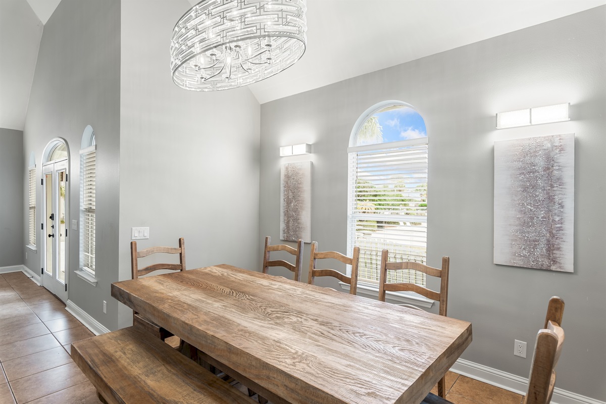 Formal dining space with rustic wood table and coastal charm