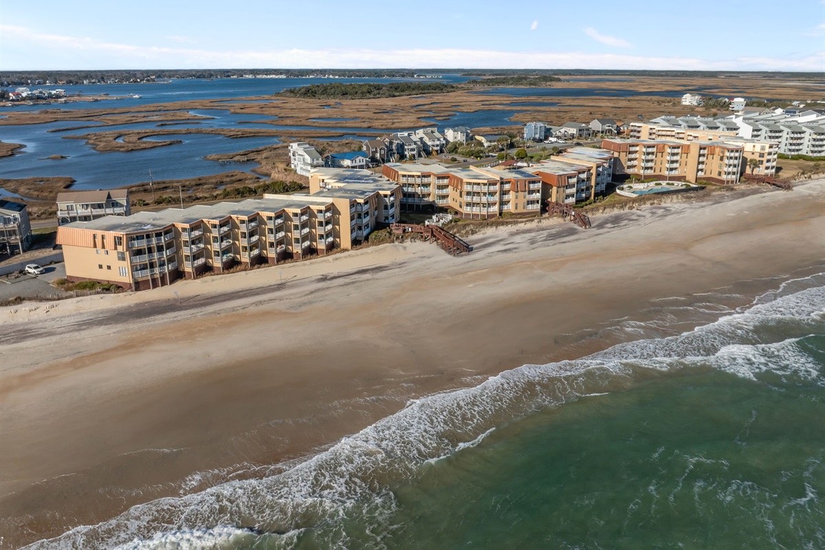 Enjoy a peaceful oceanfront setting with the beach just steps away on one side and scenic marsh and sound views stretching out behind the community