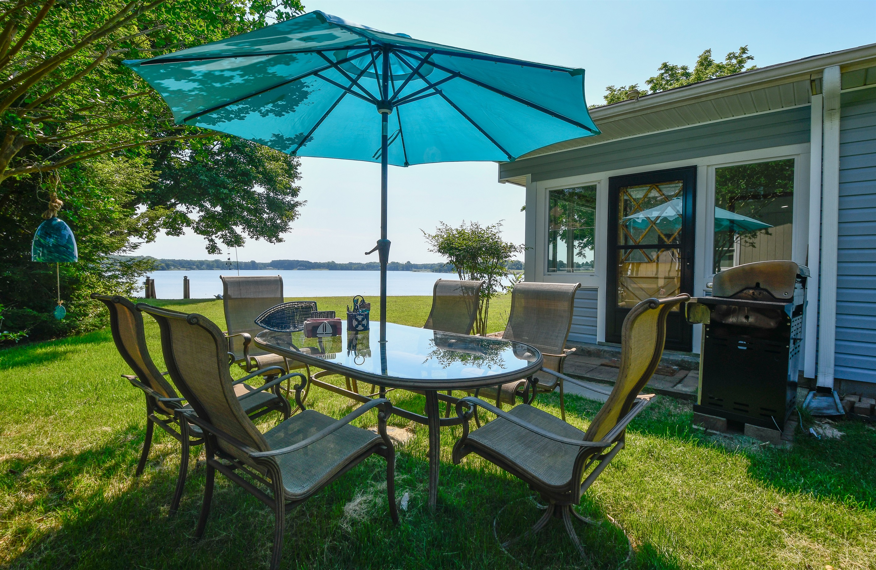 Outdoor dining with a view! Dine al fresco and tally up the points from the day to see who won. The grill is ready for a big barbecue.