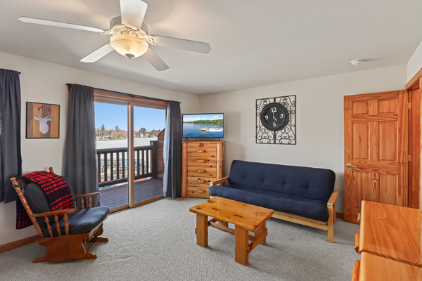 Primary Bedroom with Smart TV and Futon