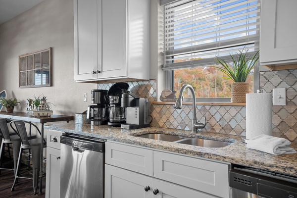 Main level kitchen. Two full-size refrigerators, two dishwashers, oven/ceramic glass cooktop, microwave, drip coffee maker, Keurig, and Nespresso. Stocked with small appliances, cookware, bakeware, utensils, dishes, glassware, mugs, and more!