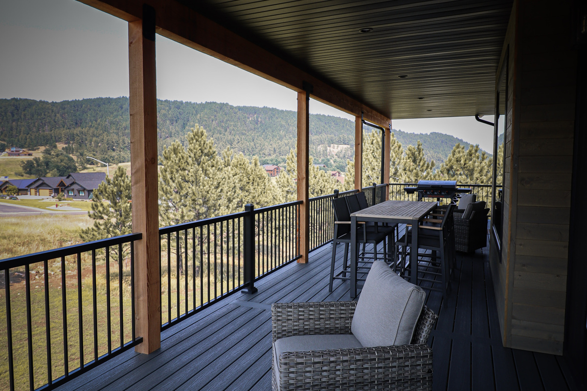 Upstairs Deck with seating and dining. 