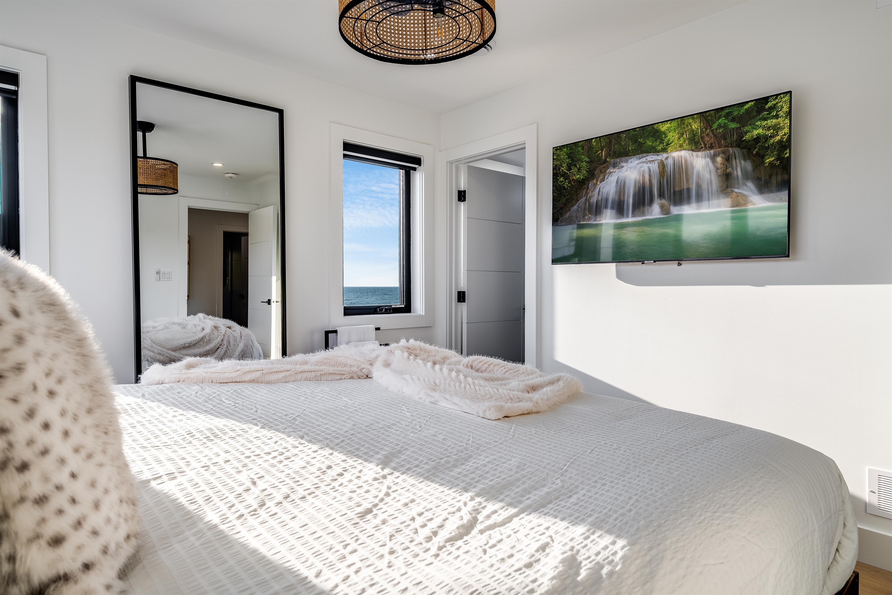 King Bedroom with Sleek lighting fixtures add refined style.