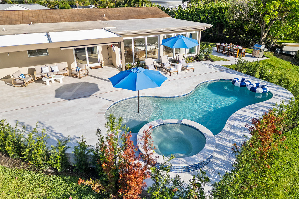 Take in panoramic neighborhood and waterway views from above and discover the home's prime location.