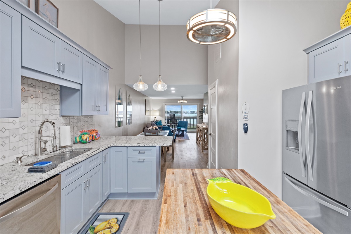 Cook with a view and stay connected to the living space and balcony beyond