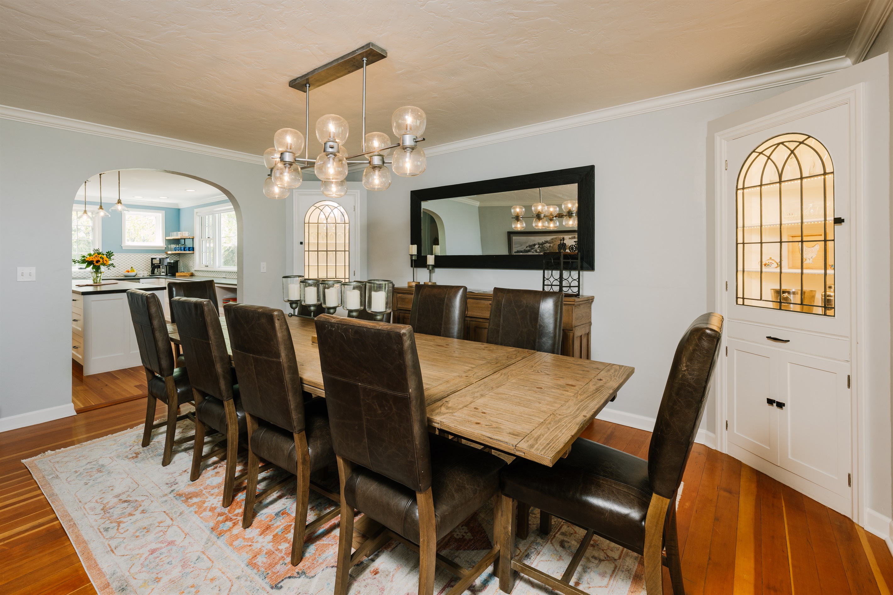 Farmhouse large dining room adjacent to chef's kitchen, seats up to 12.