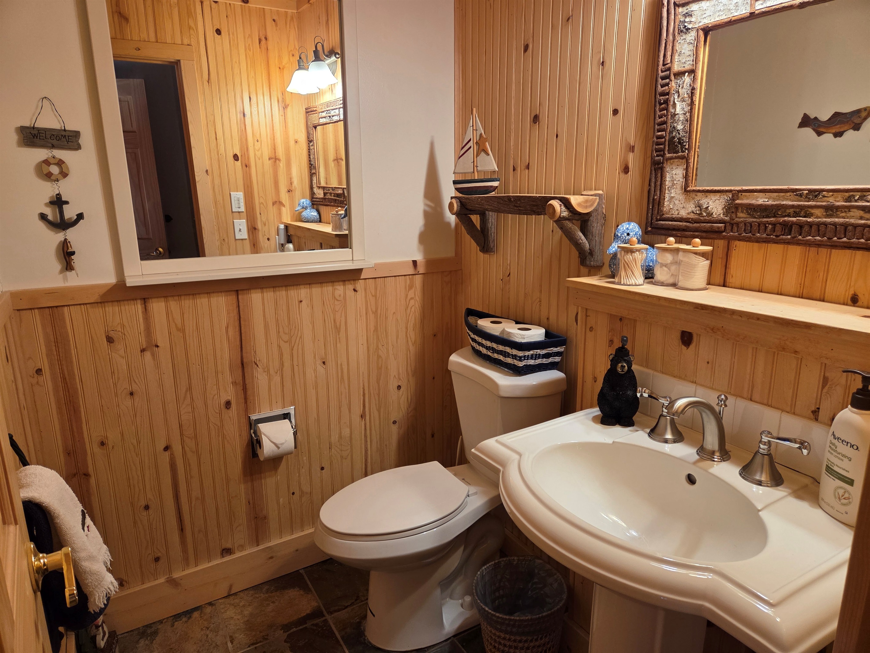 This bathroom is located in the hallway outside of the bunk room.  It has a shower, toilet and sink.  All bathrooms have basic toiletries, toilet paper and both shower and hand towels for your use.