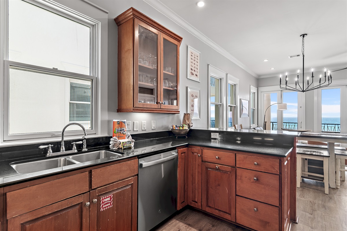 Fully-stocked, updated kitchen with Gulf Views - prepare meals for your whole group while enjoying those views!