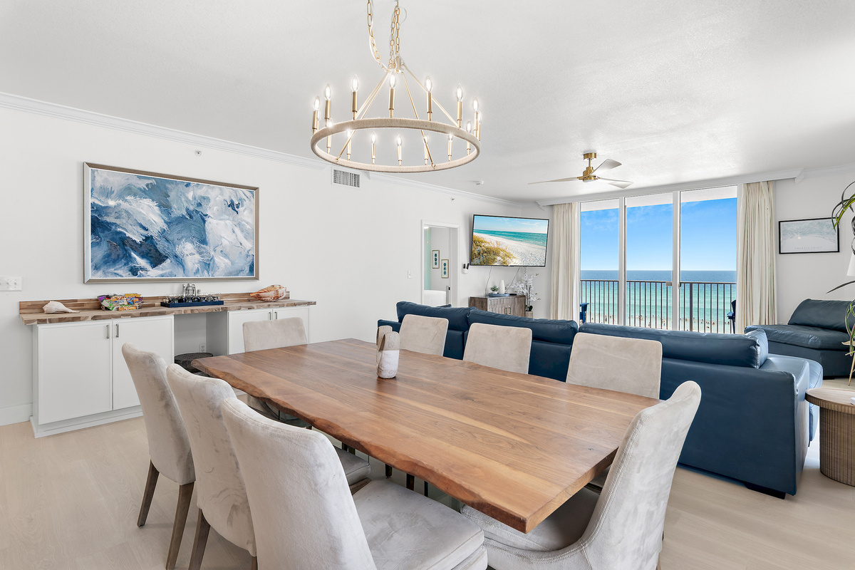 Beachfront Dining at Tidewater 201! Seating for 8 at the table and plenty of seating at the adjacent kitchen bar!