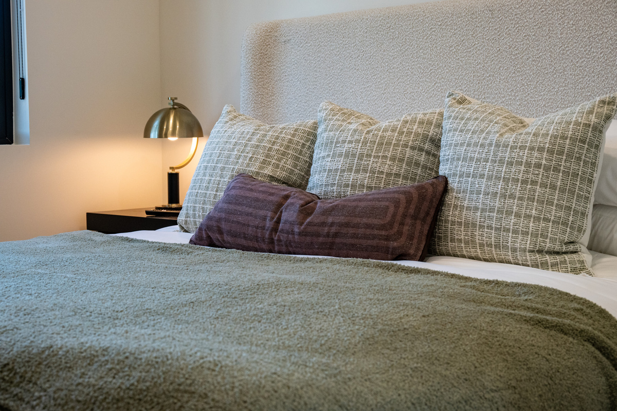 Plush king bed with premium linens for a restful night's sleep.