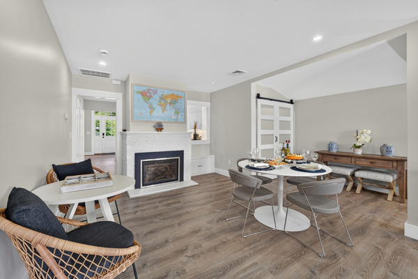 Spacious dining and living room featuring contemporary furnishings and a bright, open layout.