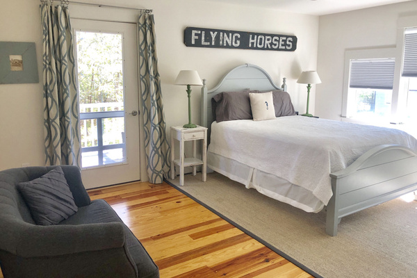 Primary Bedroom. Second Floor. Private Porch. Queen Bed. 