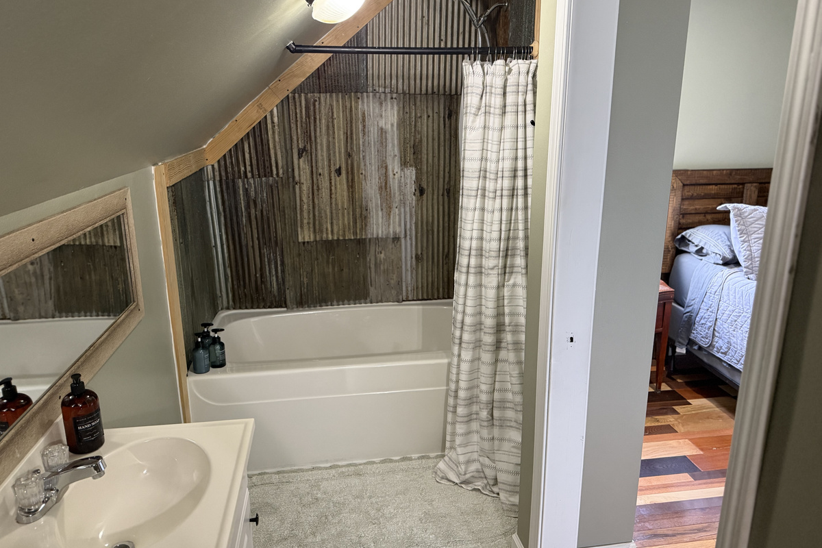 upstairs bathroom with soaps provided