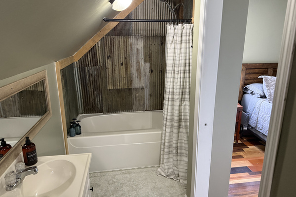 upstairs bathroom with soaps provided
