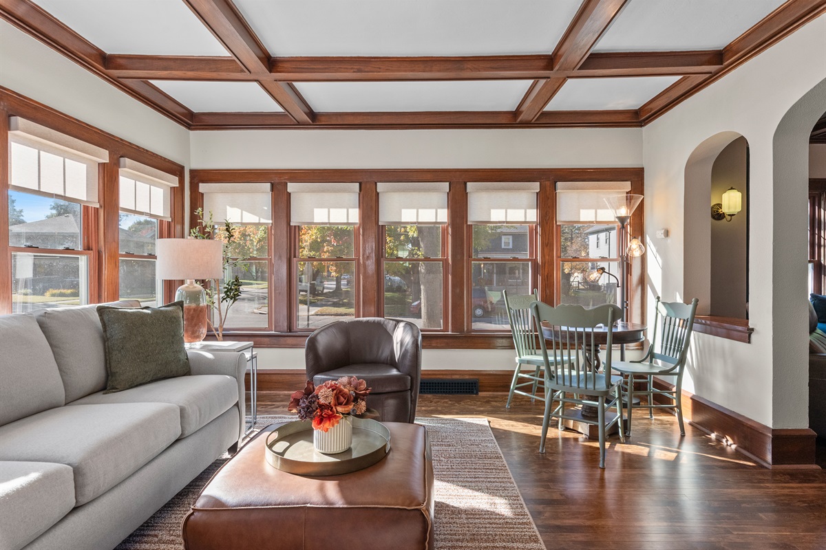 Light & bright living room with breakfast nook.