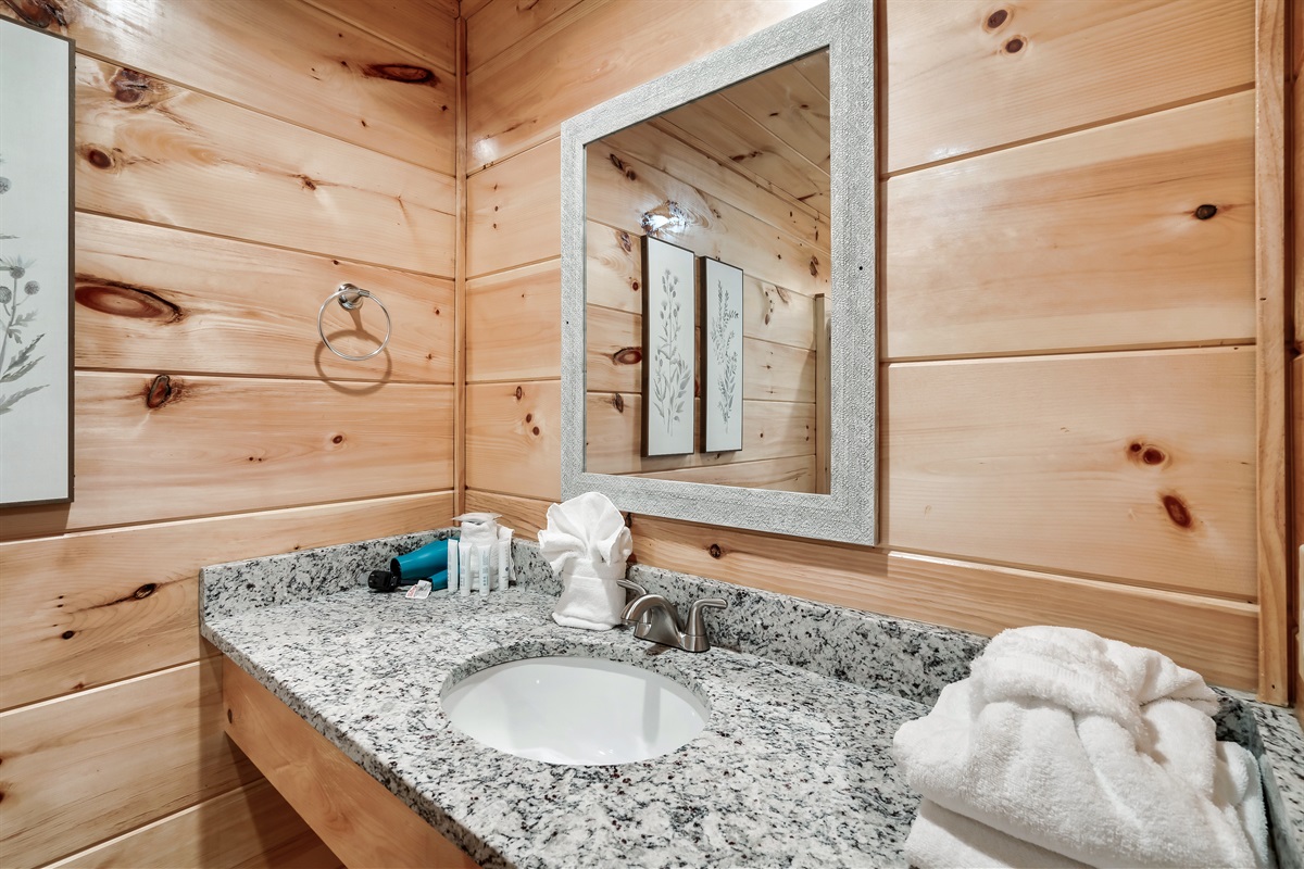 Bathroom with starter supplies and towels. 