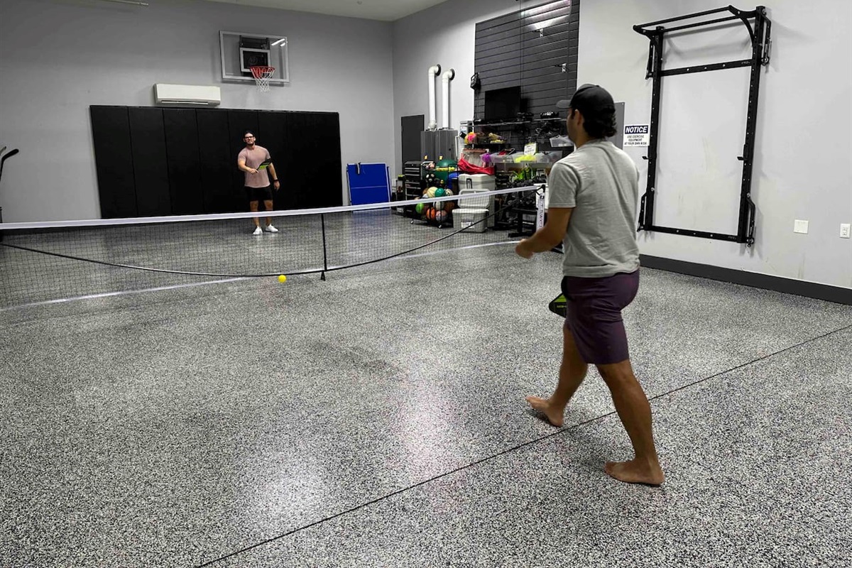 Pickleball court inside garage, we have the courtlines if needed as well