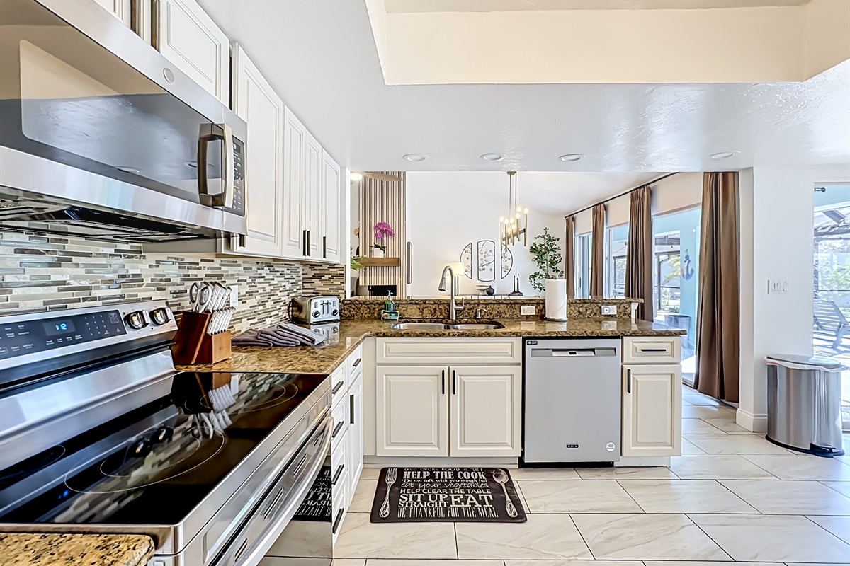 Our kitchen is an absolute dream, with its marble countertops and modern appliances. 