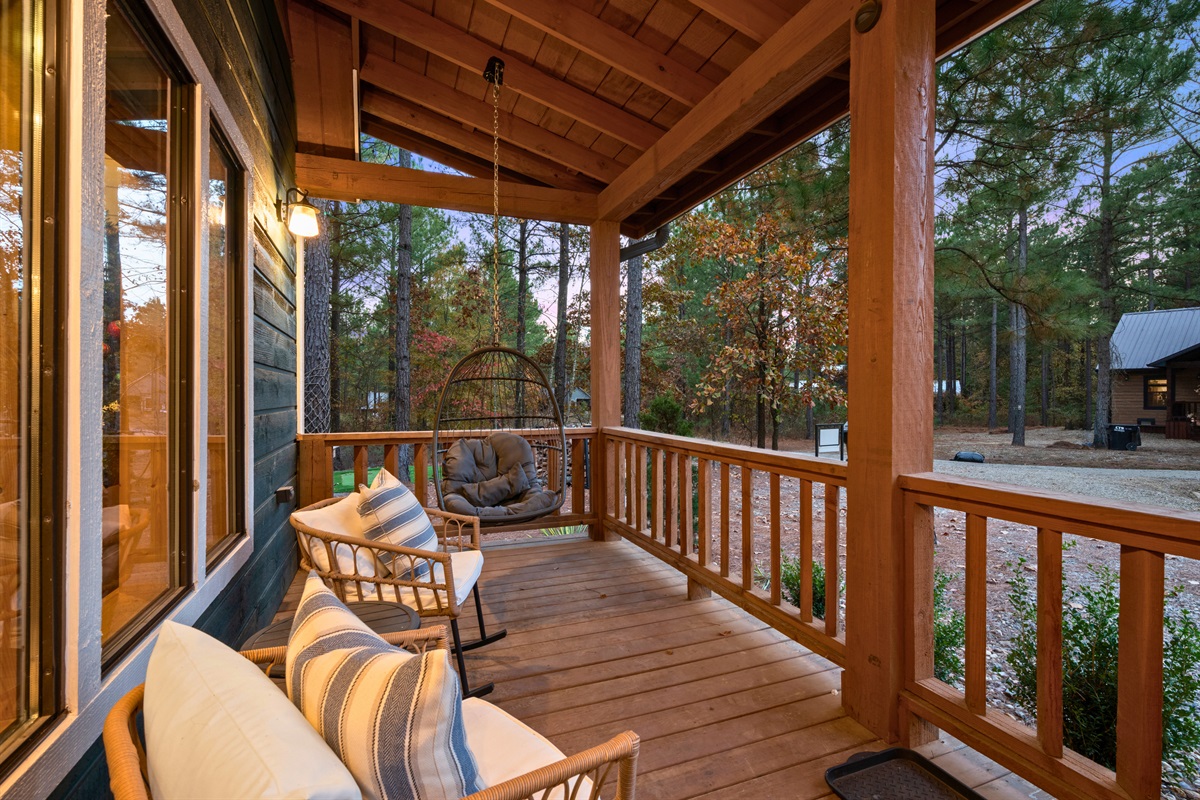 Sip your morning coffee or watch the sunset from this charming porch.