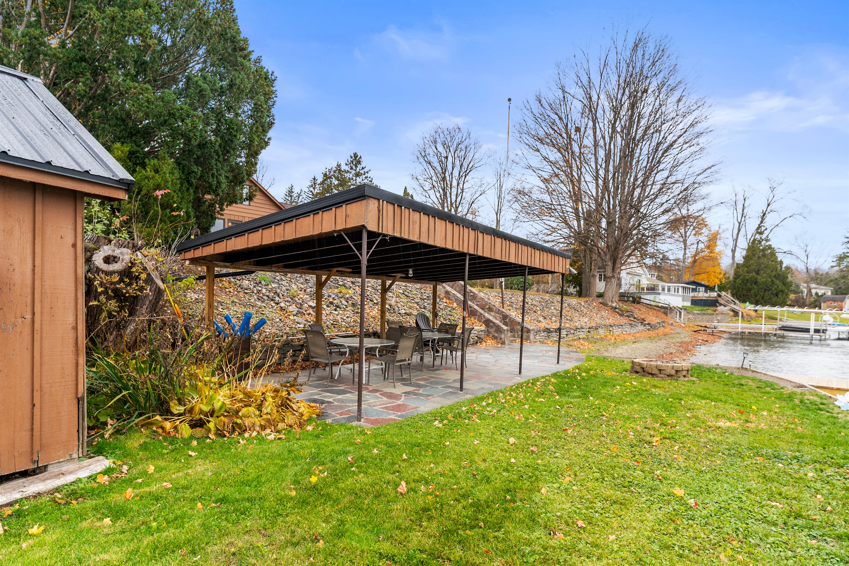 Lakeside canopy with outdoor dining area