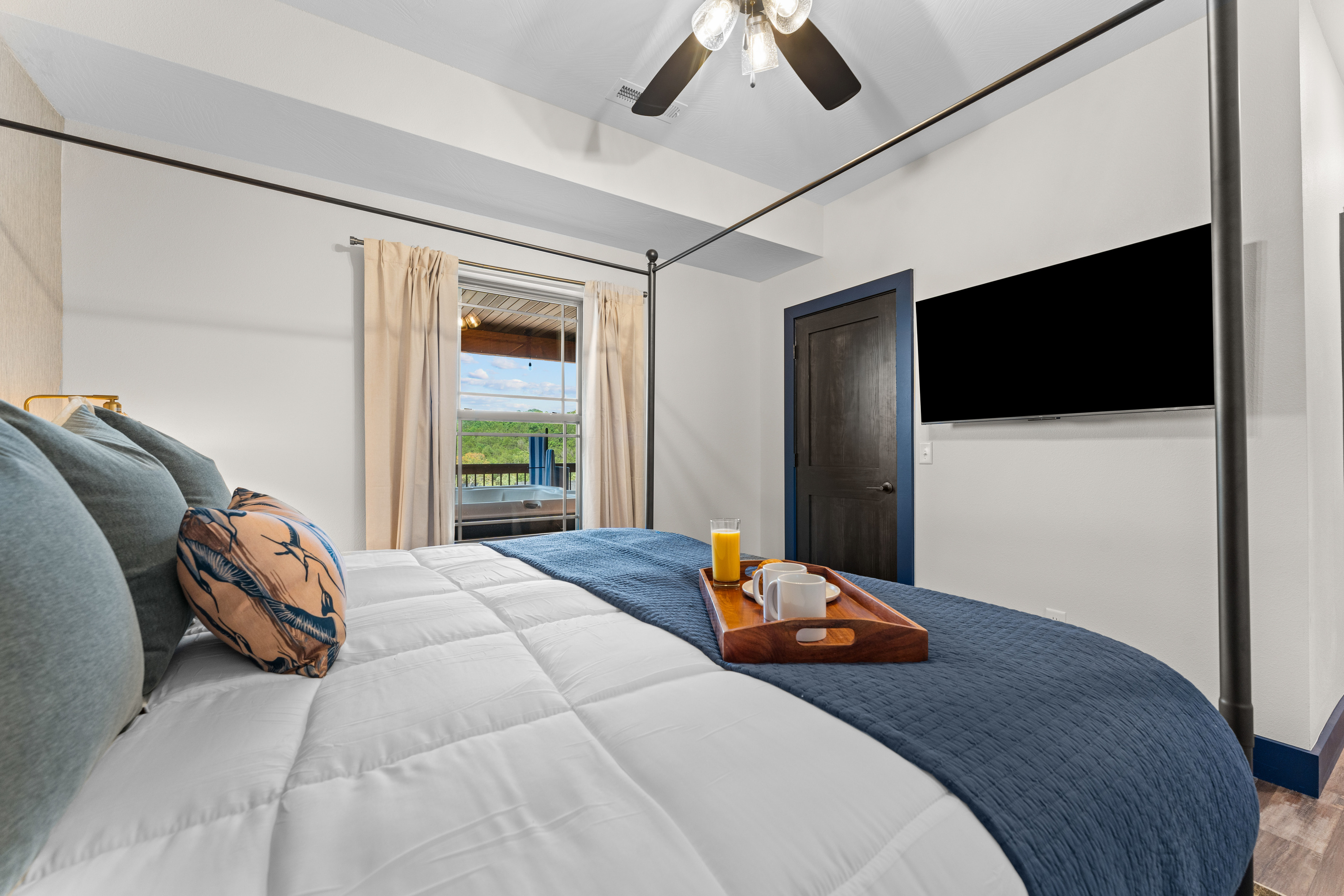 Stream a show from the canopy king bed on the Smart TV, then step out to your private balcony.
