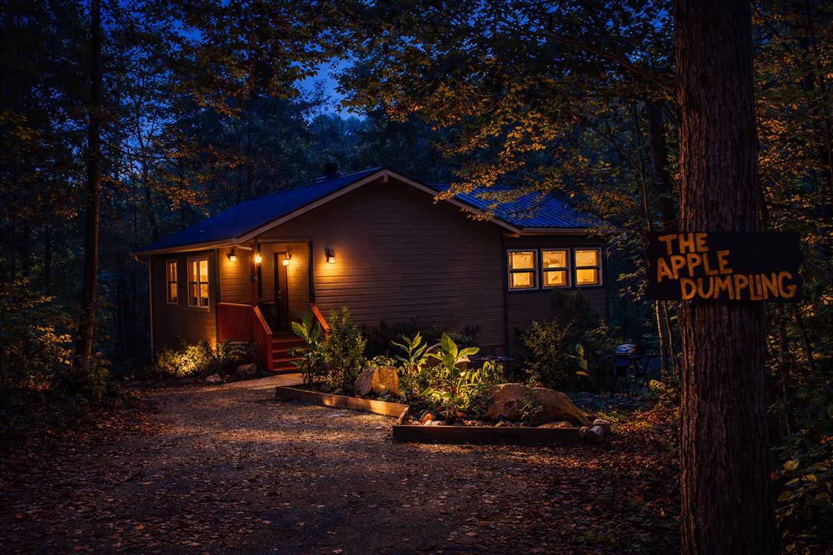 Twilight magic at The Apple Dumpling—where glowing lights, quiet woods, and cozy nights await.