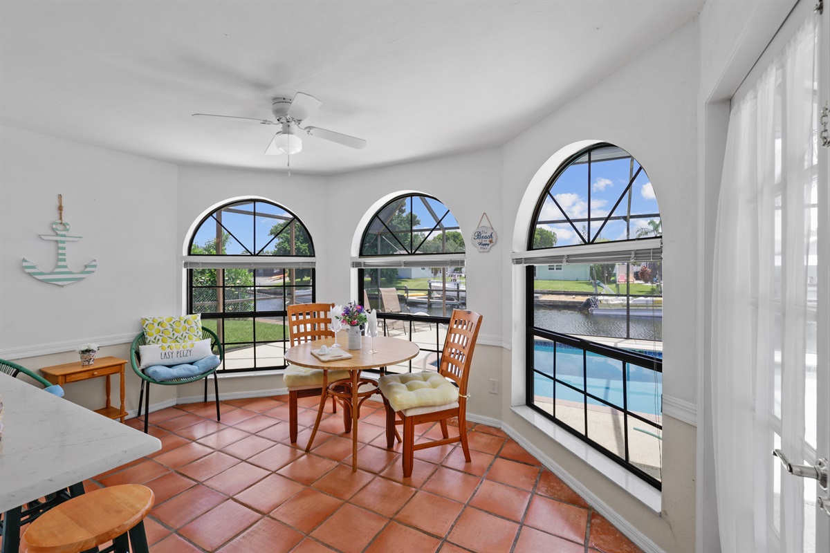 Sunny seating with a pool view