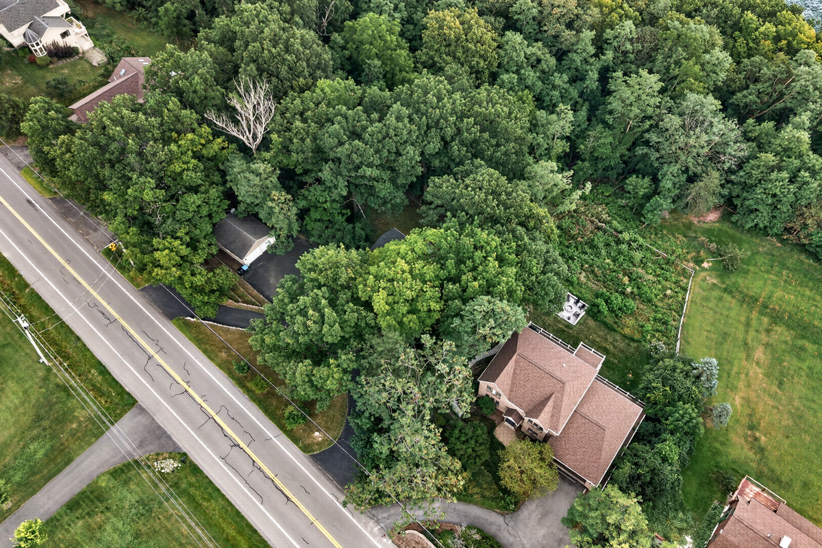 Aerial view of the house near the road