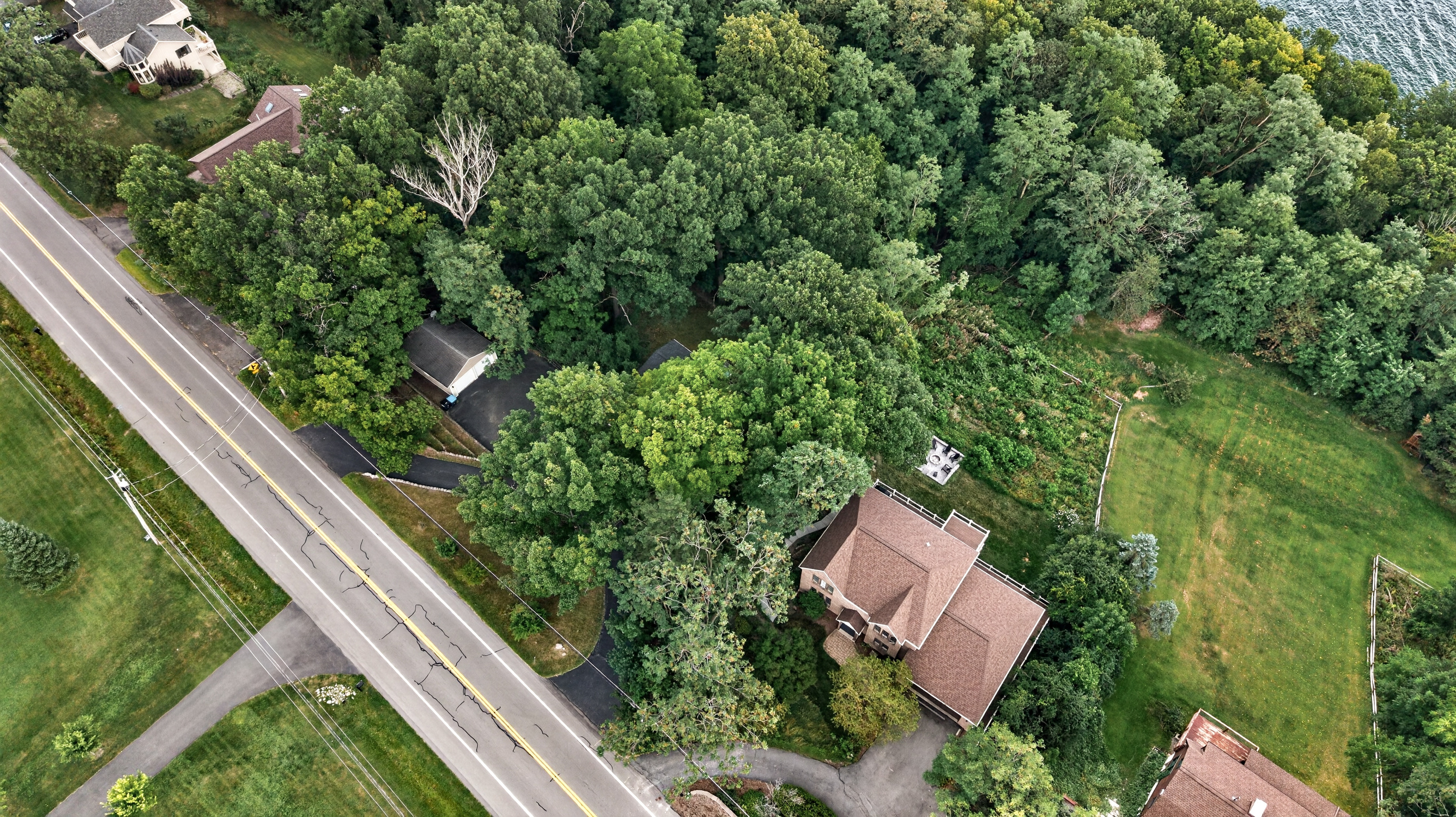 Aerial view of the house near the road