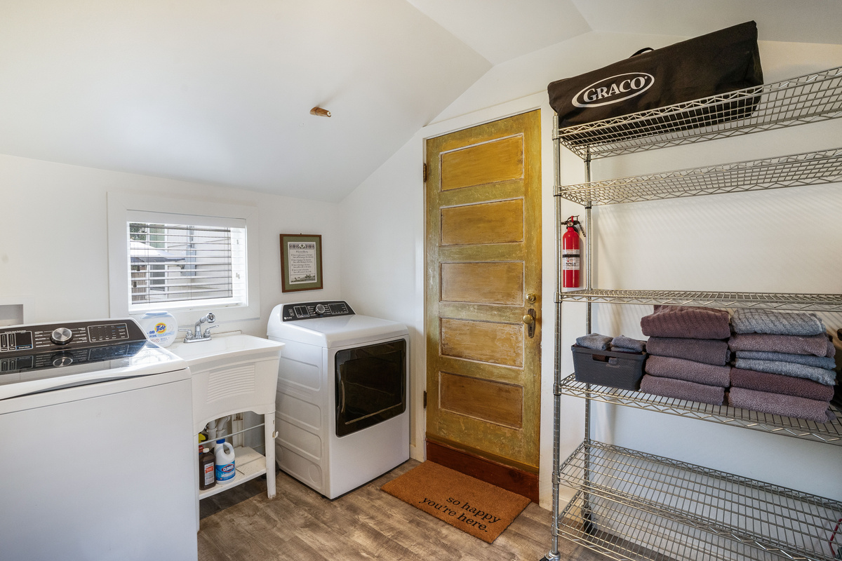 Enter the washroom from the carport at the back of the home.