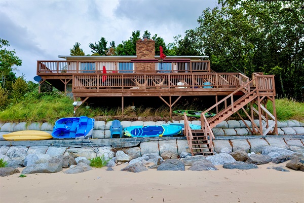 Front of the cottage and large deck. View from the Lake.
