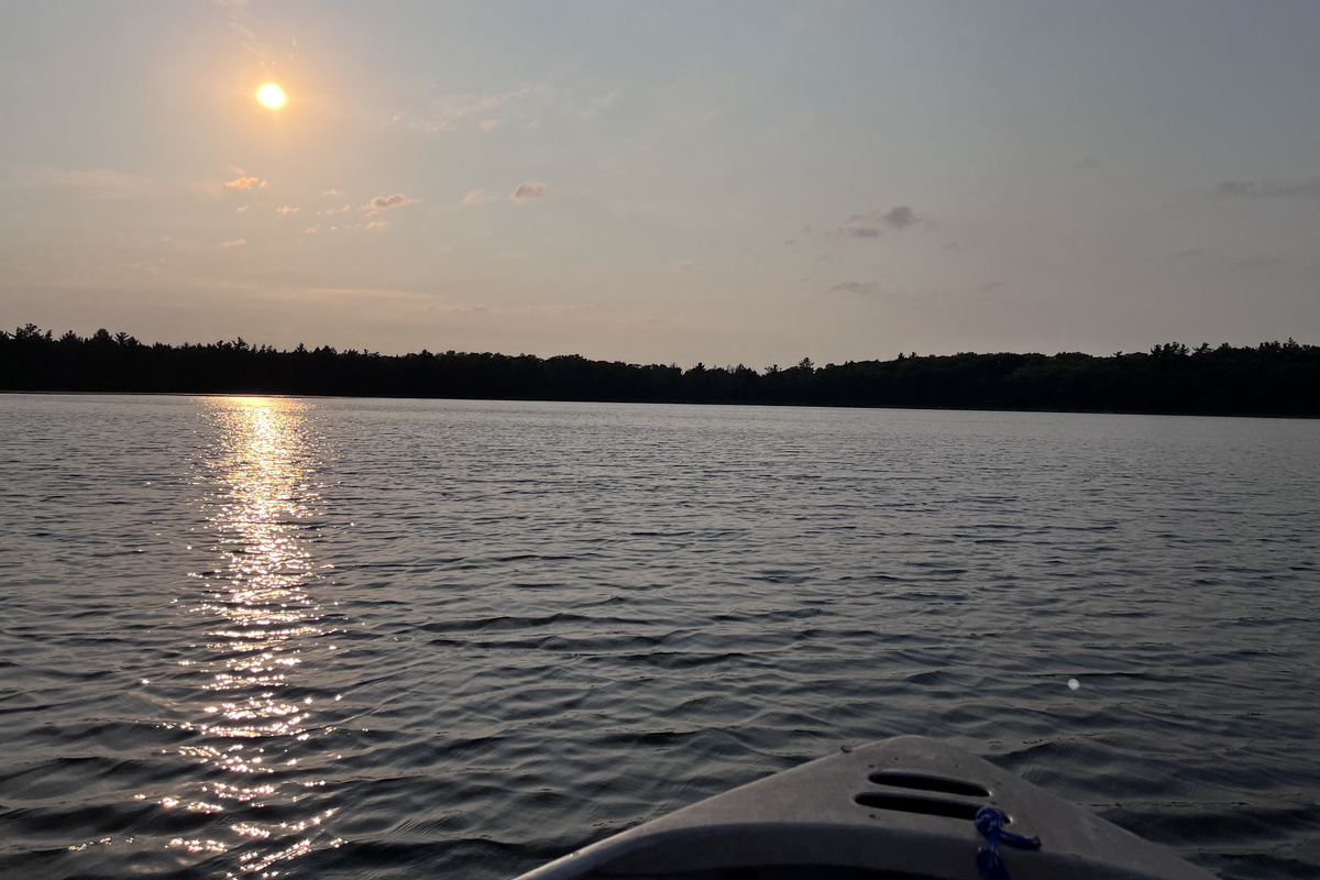 Fishing out on the boat at sunset.