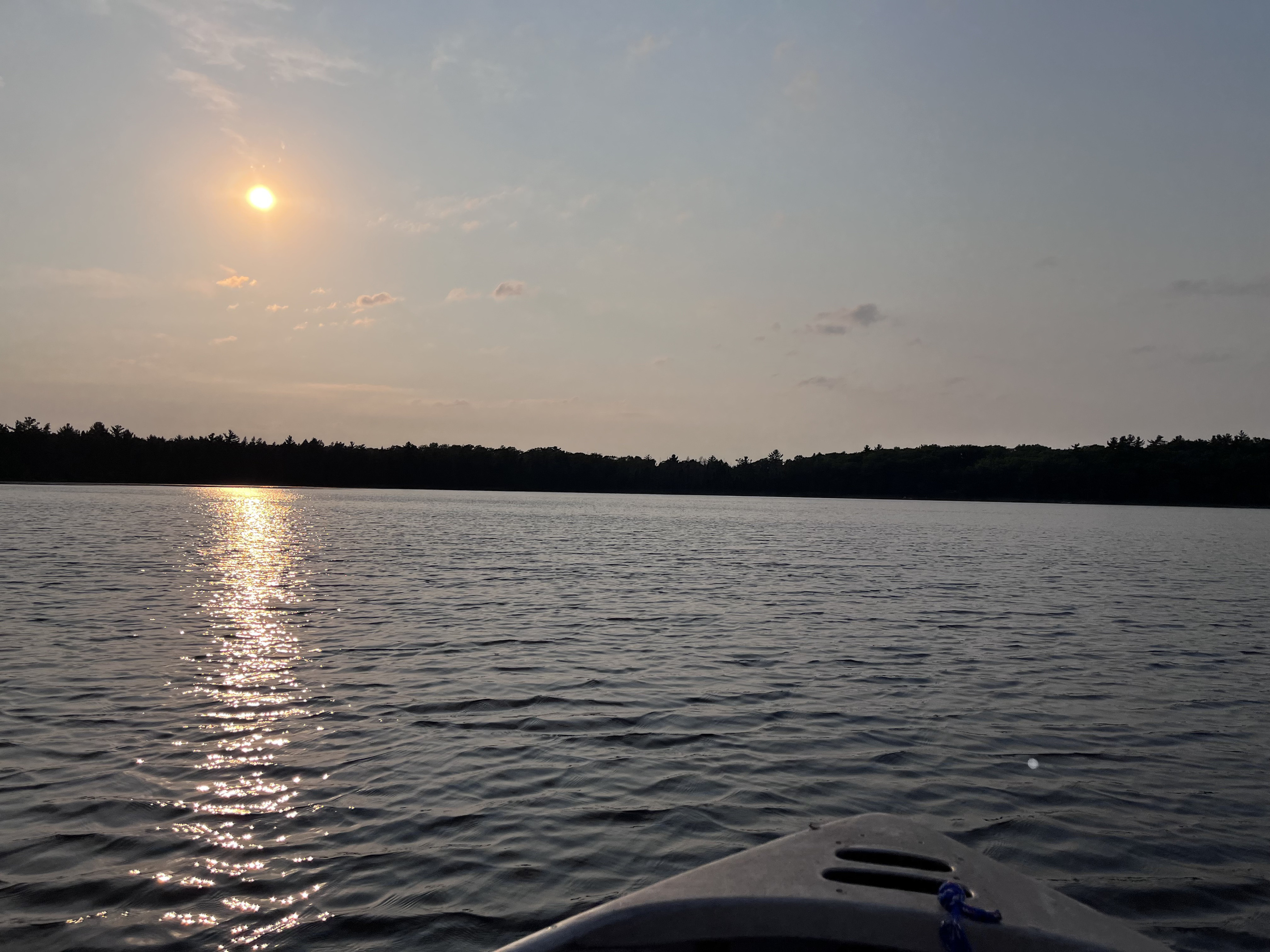 Fishing out on the boat at sunset.