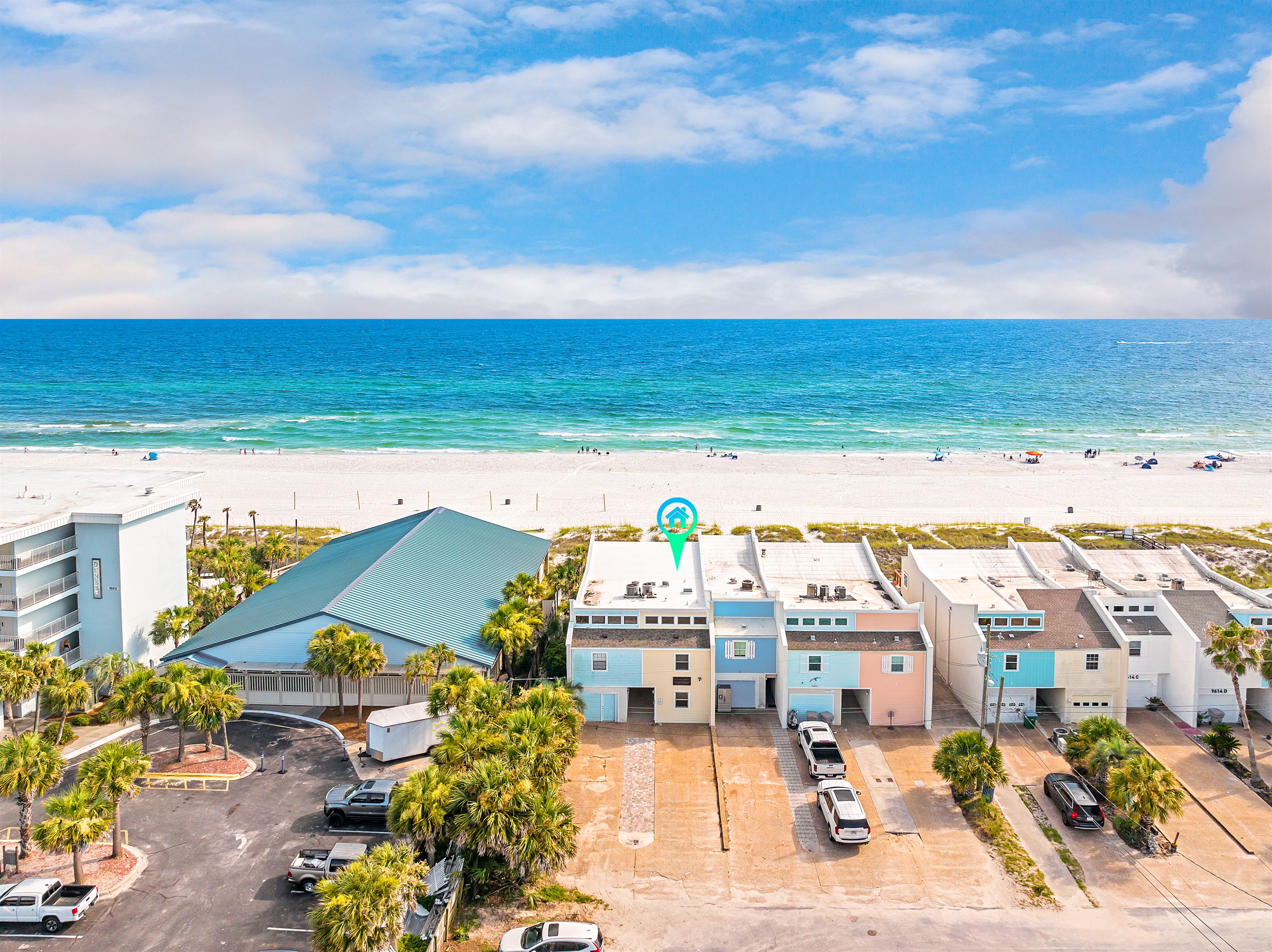 Wake up to the sound of waves and breathtaking views of the Gulf from these stunning beachfront townhouses. With direct beach access, you're just steps away from sunbathing, swimming, and beach fun.