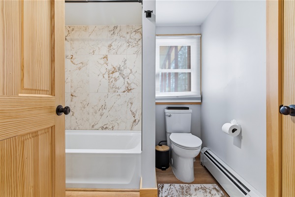 Unwind in the full bathroom with a relaxing bathtub after a day of adventure.