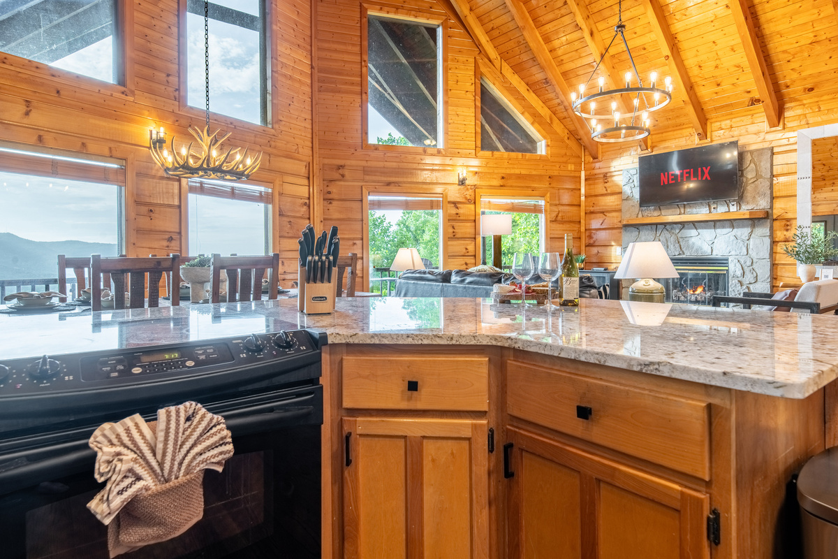 Open kitchen area with granite countertops.  Skycrest retreat is well stocked with cooking and dining wares.