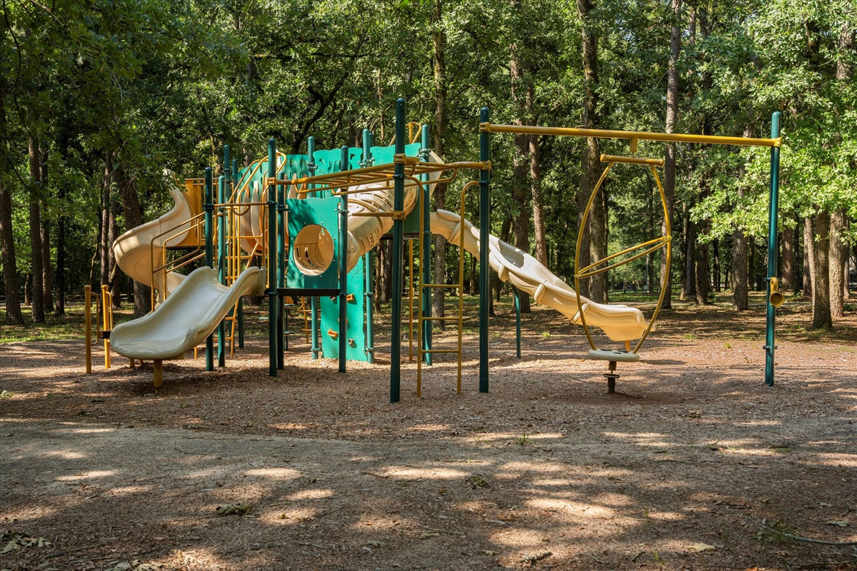 A fantastic playground just a block from home, surrounded by towering trees for shade. Featuring multiple slides, climbing structures, and interactive elements, it’s perfect for kids to explor