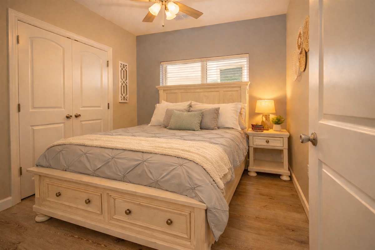 Relax in this inviting queen bedroom