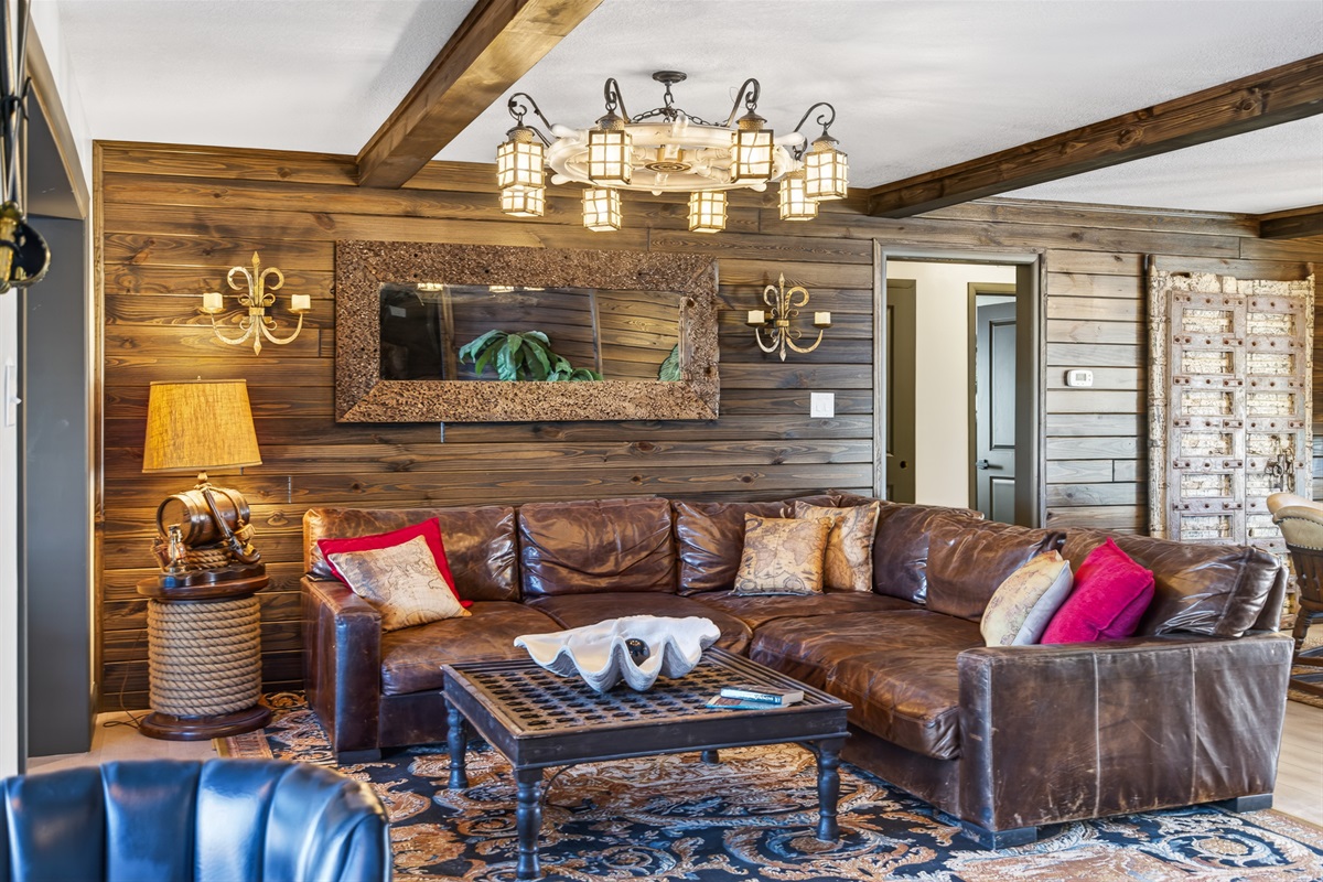 Crew’s Lounge – Spacious living room with a large TV, perfect for charting adventures, swapping stories, or watching the latest treasure‑hunting 