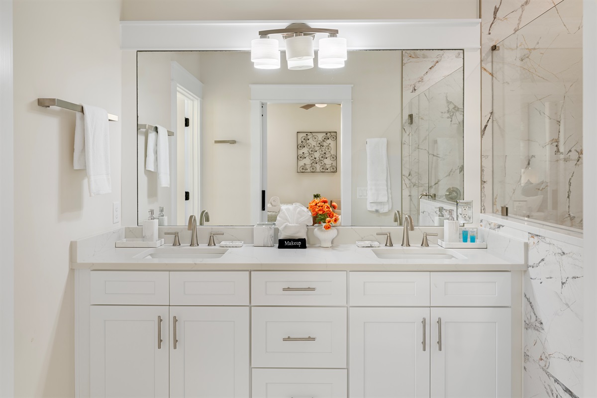 Private Ensuite Bath with dual sinks and modern finishes