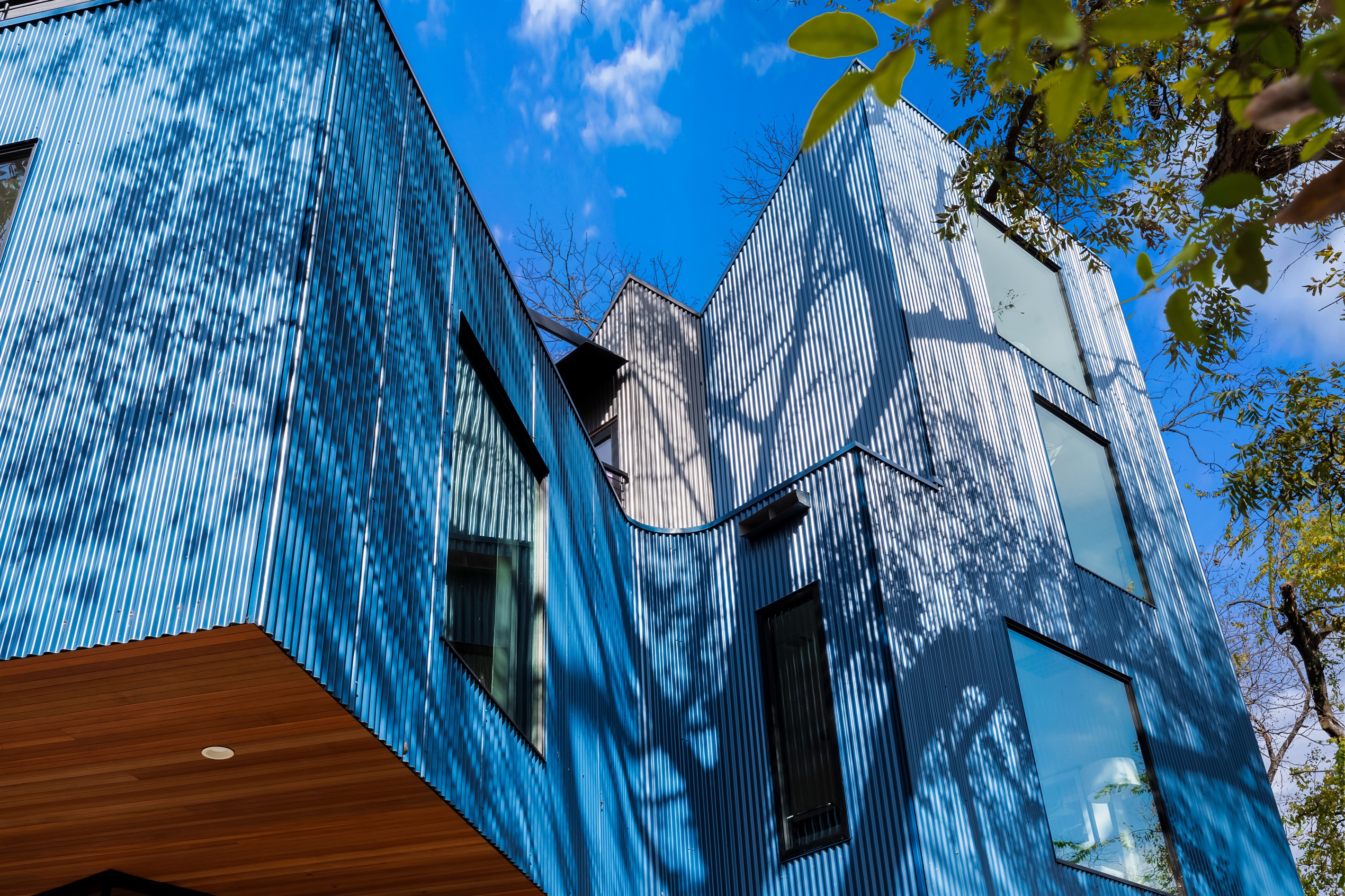 Unique multi-level home with bold lines and elevated views, offering privacy and a true Austin-style retreat.