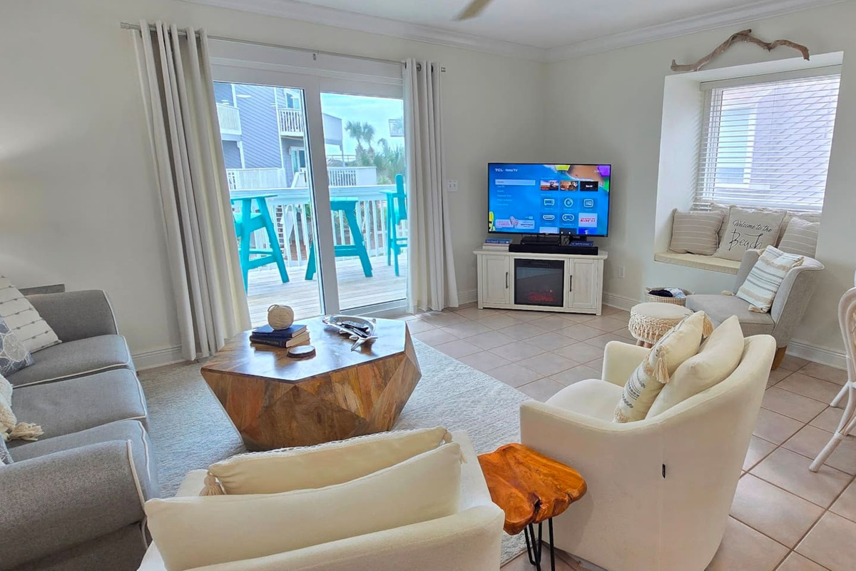 Stream your shows or flip on the electric fireplace and let the room do the talking &mdash; the living area has both covered for every kind of evening.