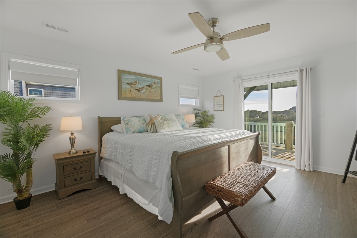 Primary suite furnished with a King bed - perfect for restful beach nights!