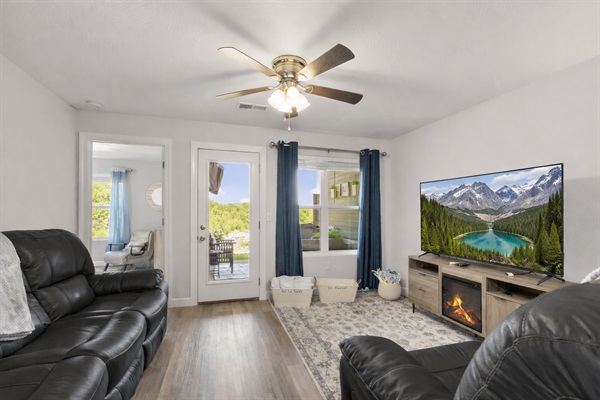 Leave the cares behind as you unwind in this cozy, bright living room. Spacious with breathtaking views of the mountains. Step outside onto your private patio and enjoy your personal hot tub to end the perfect day.
