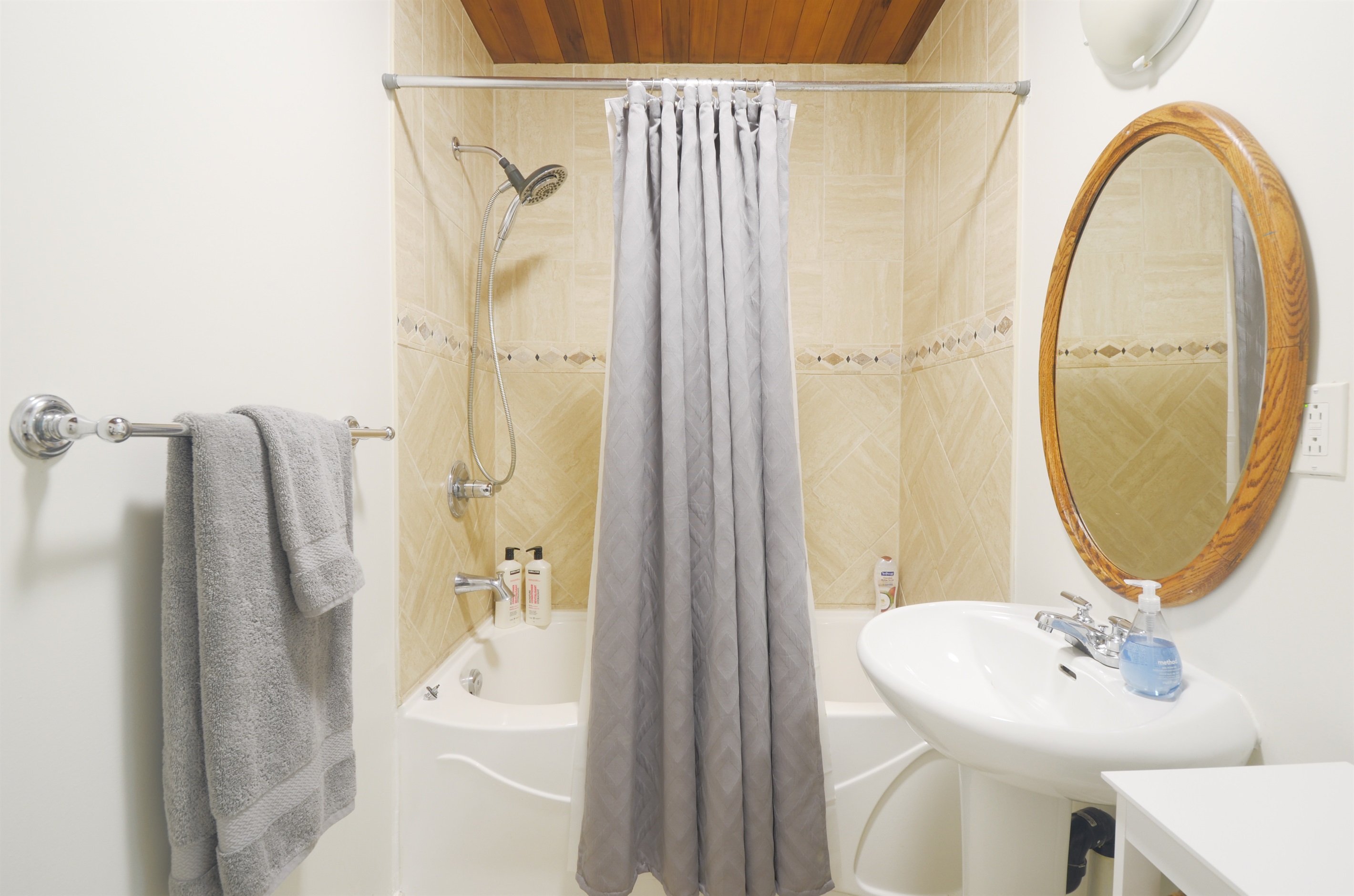 Main bathroom with shower and tub combo